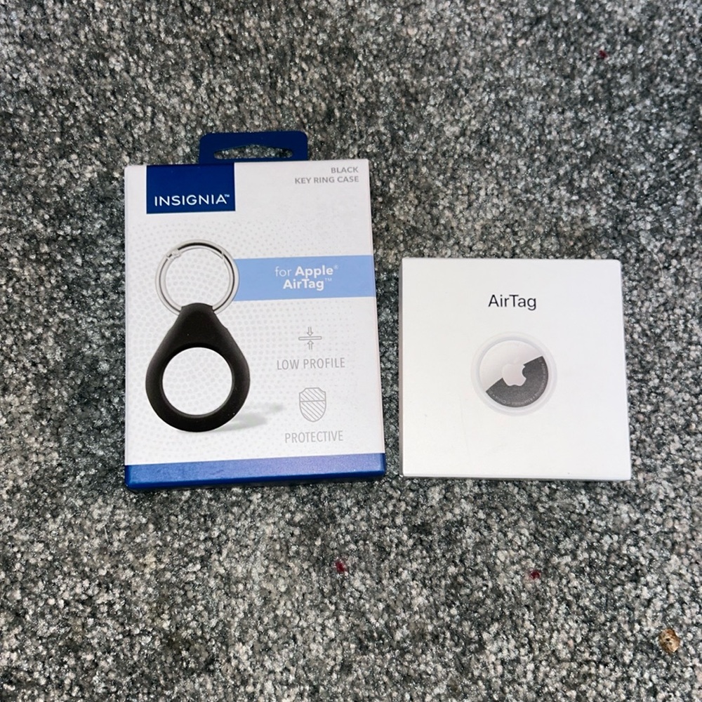 Apple Air Tag with key ring holder. Both unused & unopened